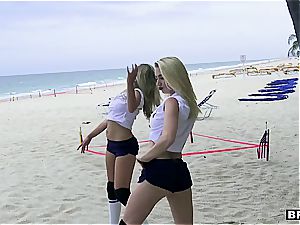three teenage cuties catch a large impaler on the beach